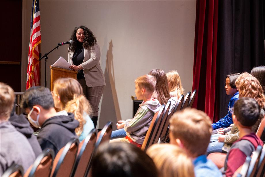 Host Jasmine Davis (academic coach) addresses the students